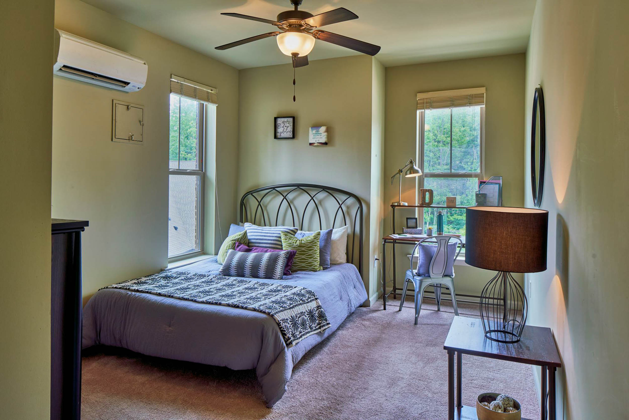 Bedroom with bed and desk