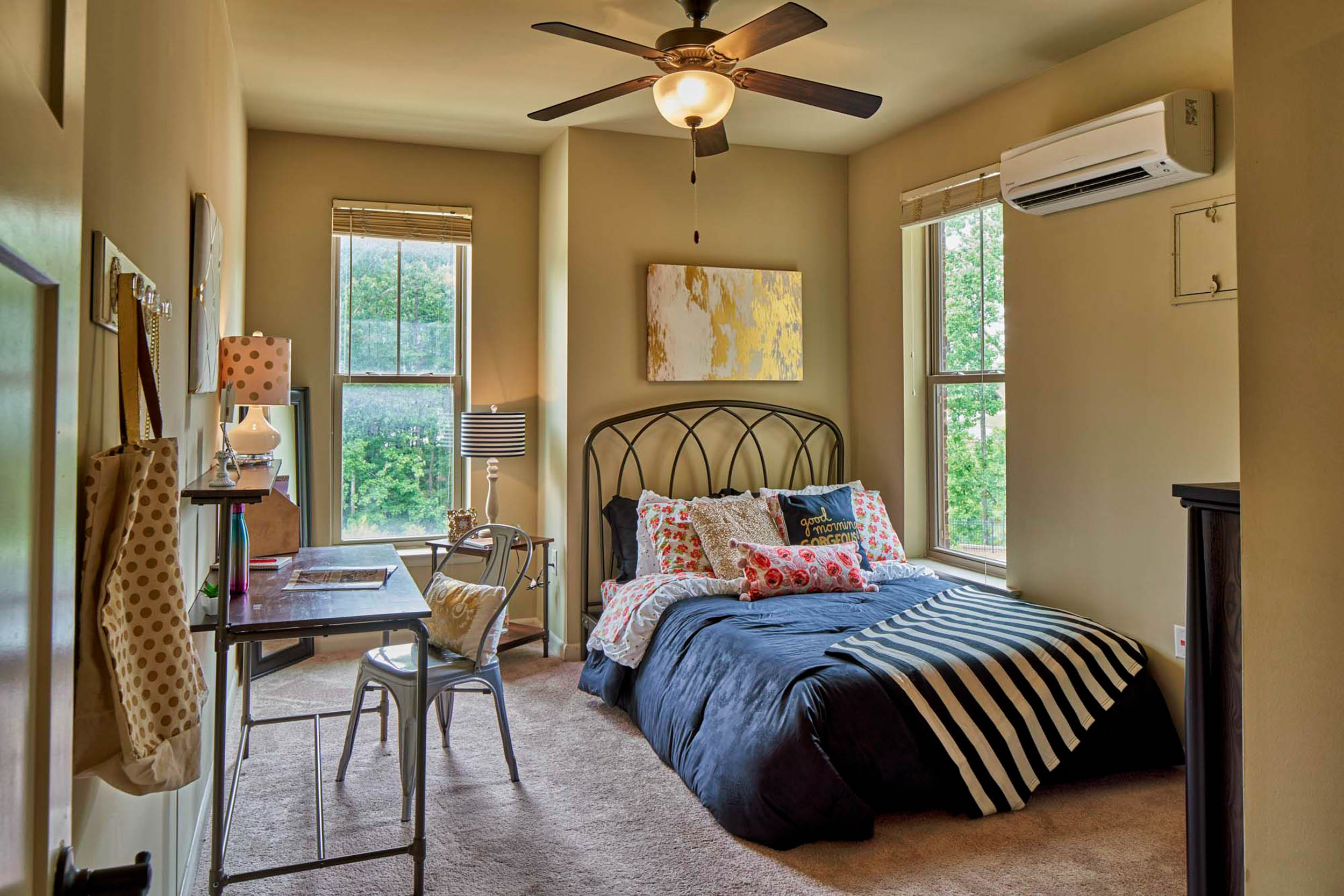 Bedroom with blue pink and gold decor